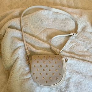Cream crossbody purse with gold studs